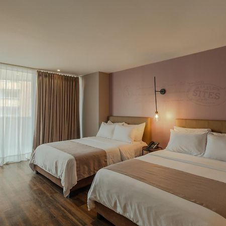 Sites Hotel Medellin Luaran gambar A room at the hotel