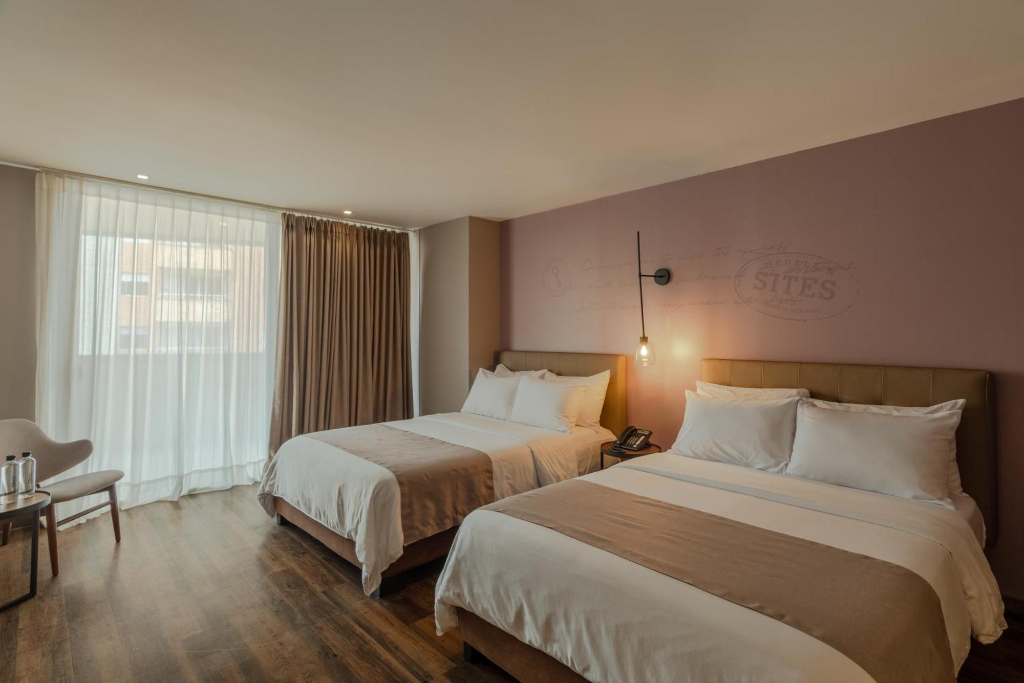 Sites Hotel Medellin Luaran gambar A room at the hotel