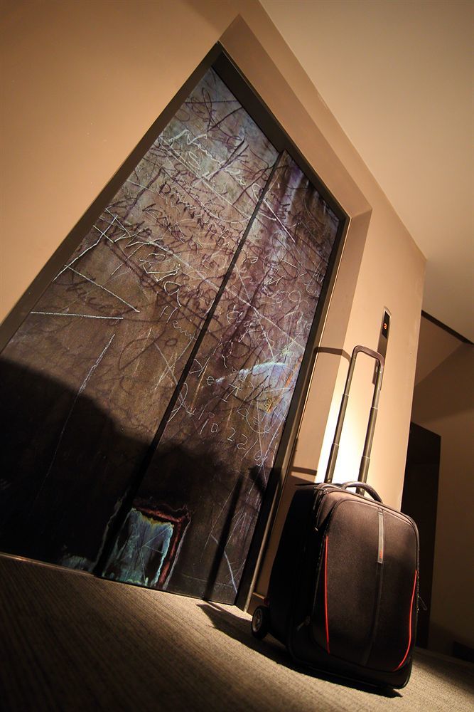 Sites Hotel Medellin Luaran gambar Marble wall