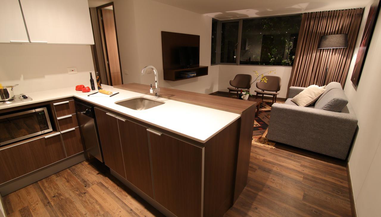 Sites Hotel Medellin Luaran gambar A modern open-plan kitchen